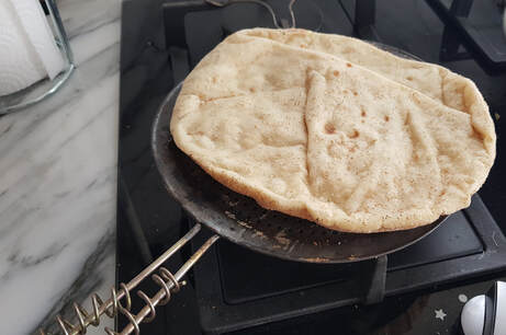 shayata, utilizada para aquecer o pão árabe